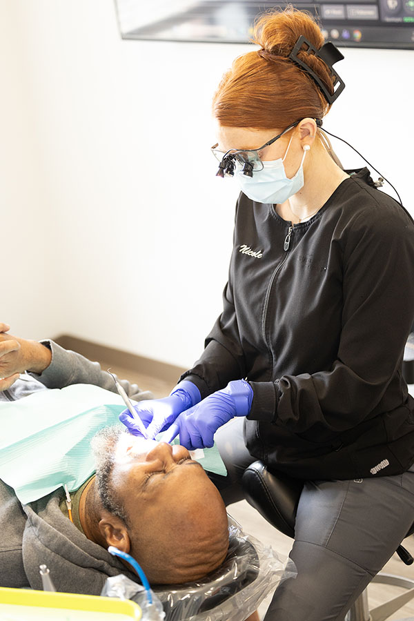 dental implant professional maintenance cleaning visit hygienist southaven ms