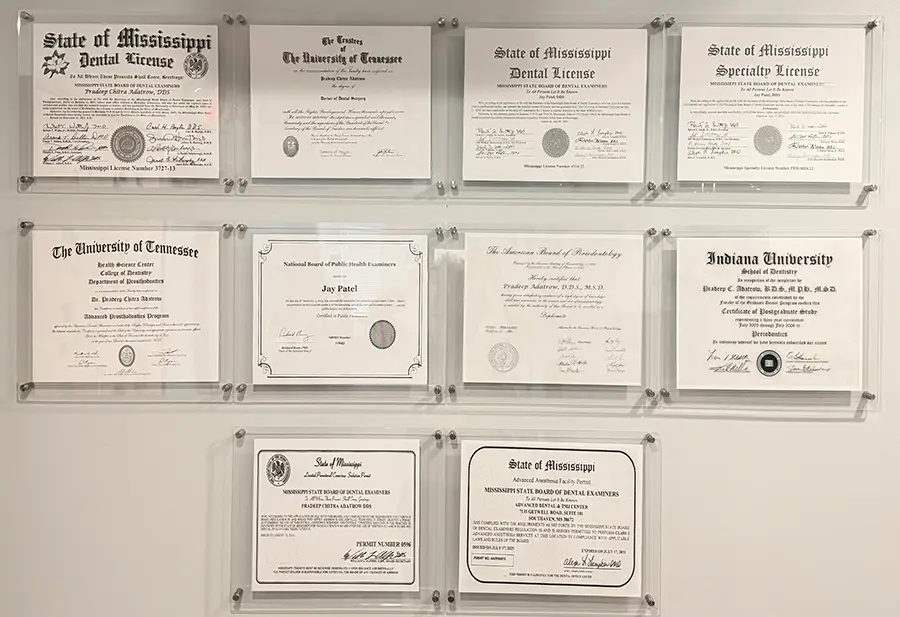 Dr. Adatrow, dual board certification diplomas, periodontology, prosthodontics credentials